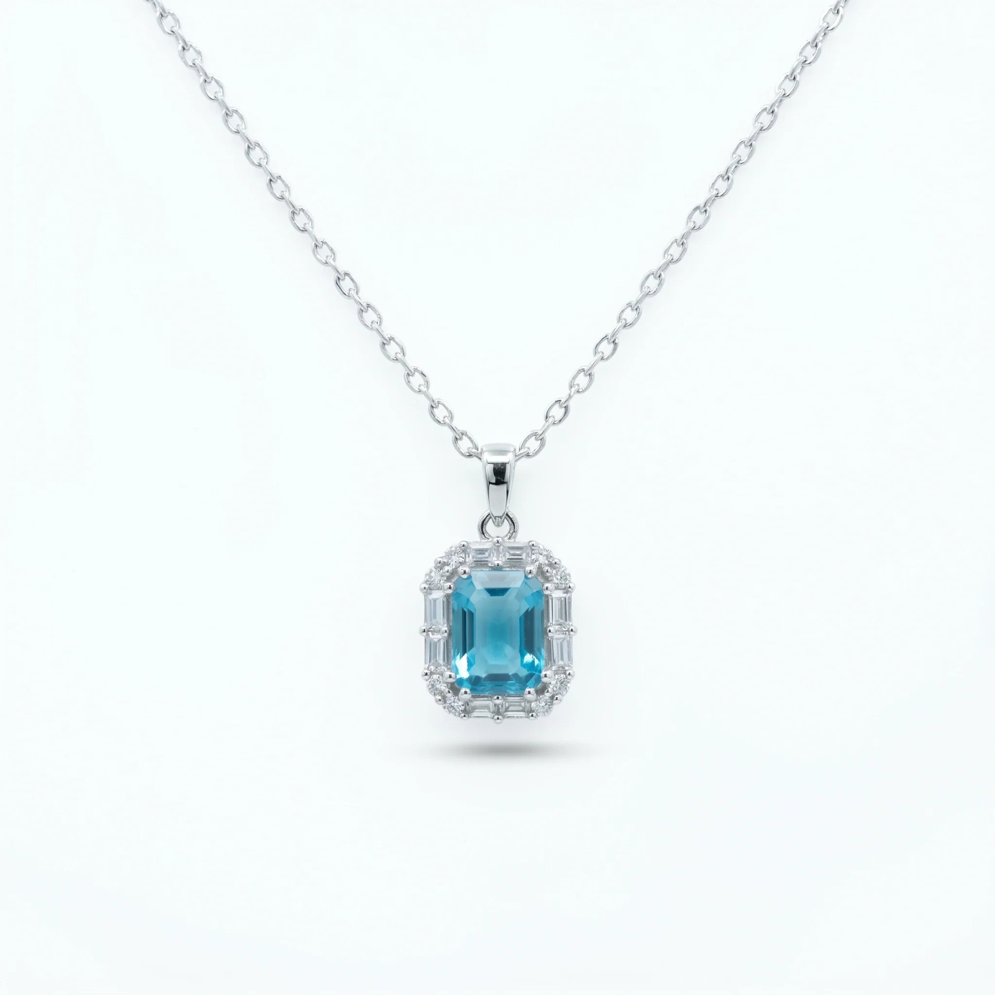 Aqua Halo Emerald Pendant