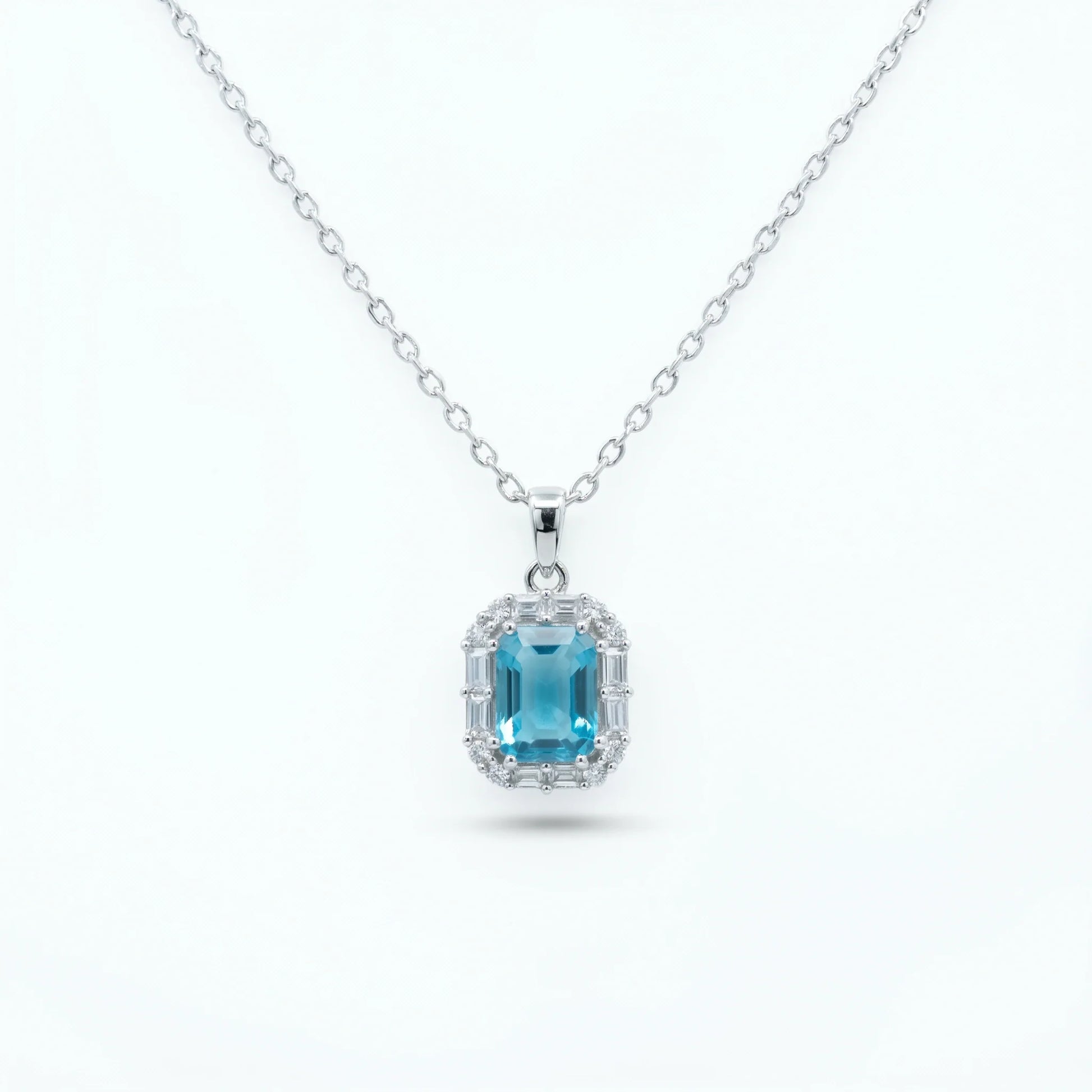 Aqua Halo Emerald Pendant