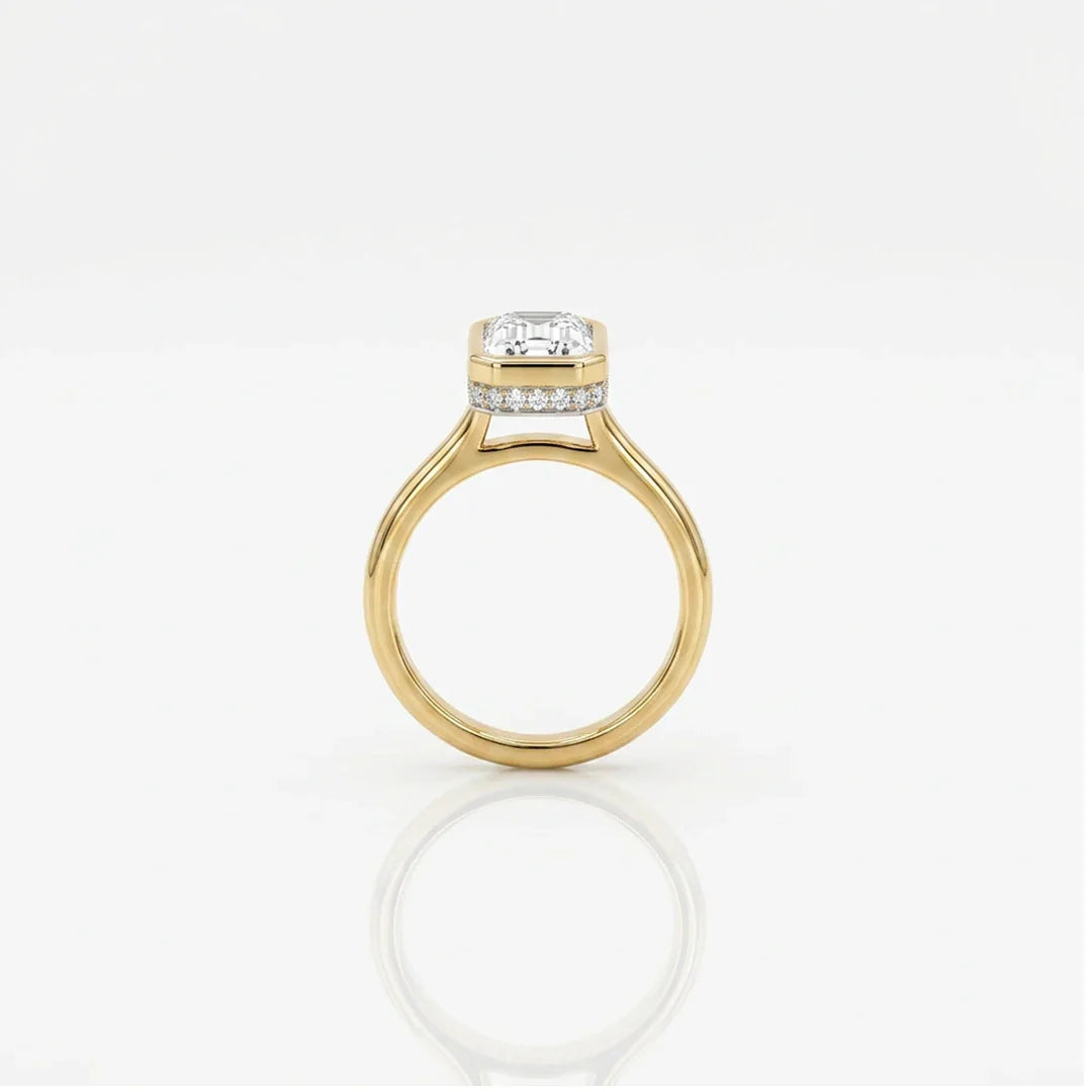 Gold Emerald Cut Bezelle Ring