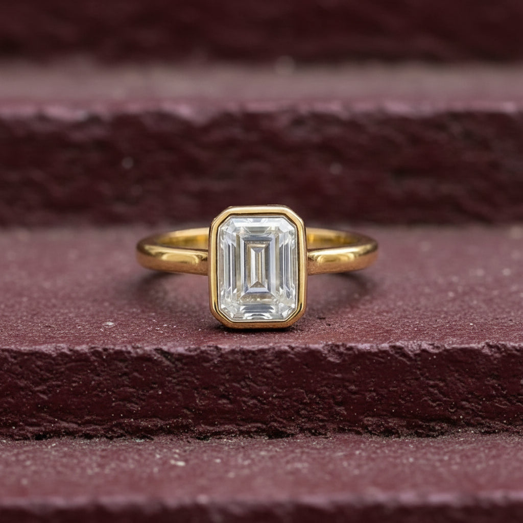 Gold Emerald Cut Bezelle Ring