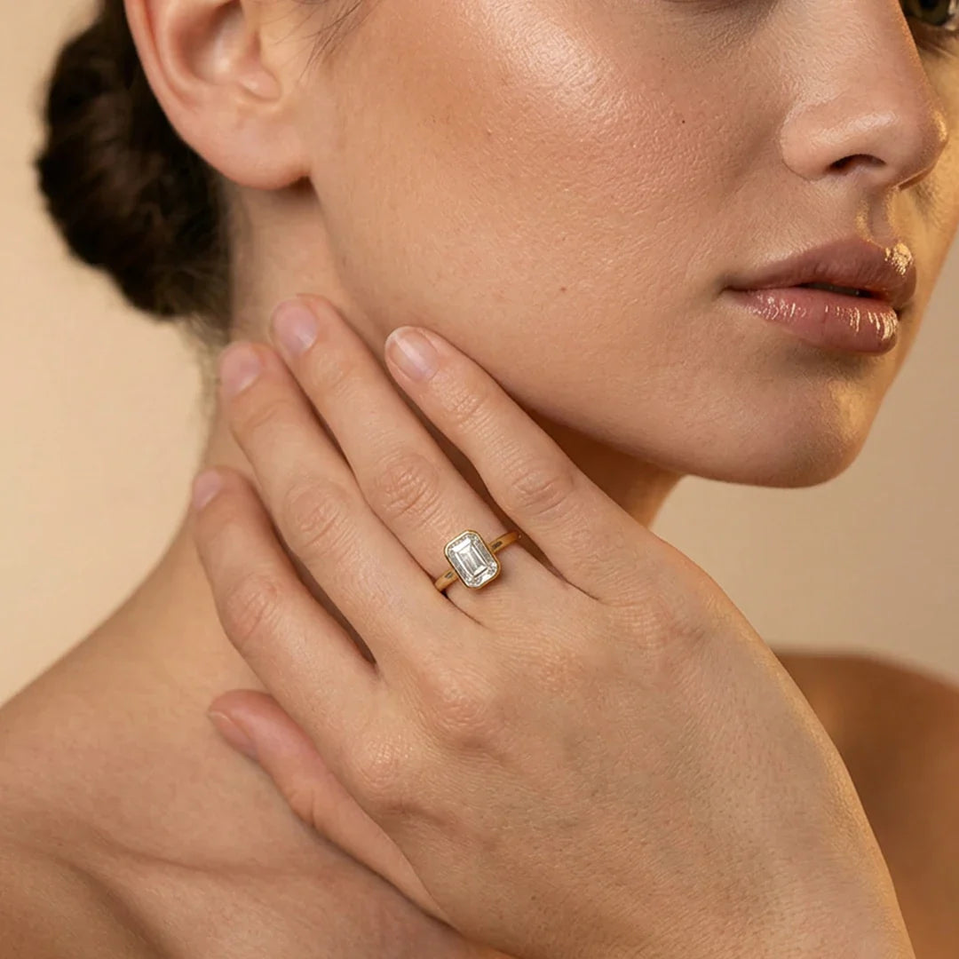 Gold Emerald Cut Bezelle Ring