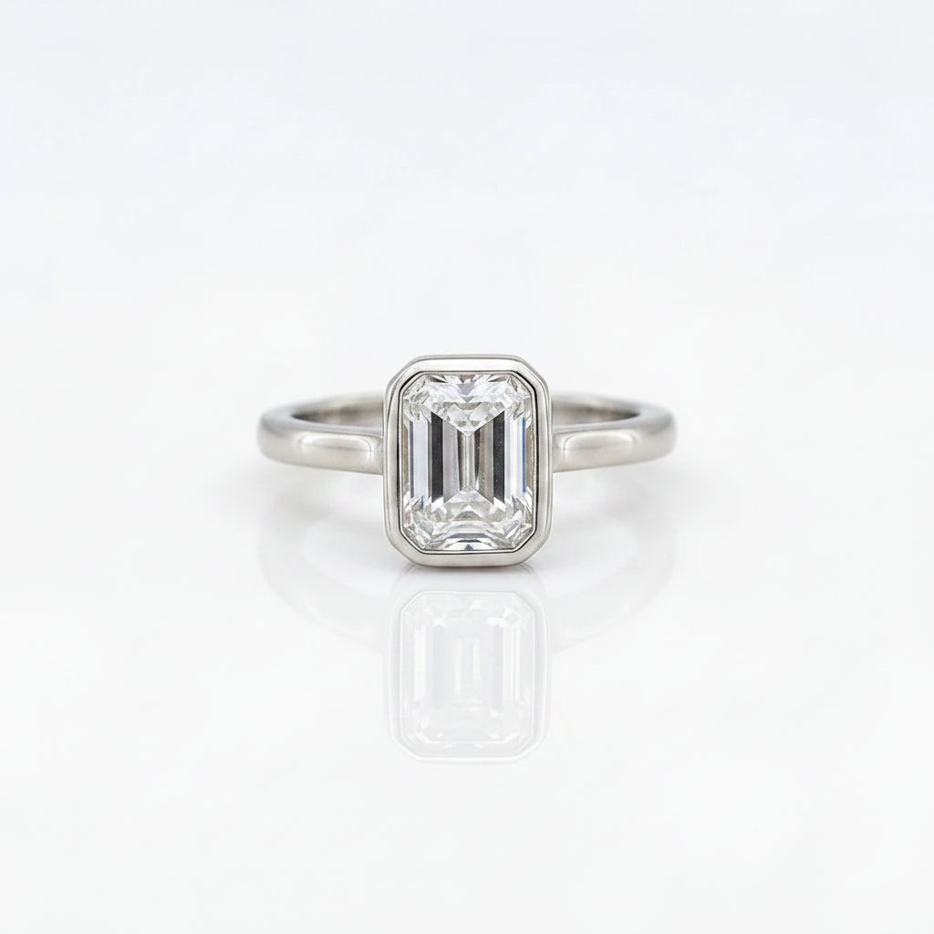 Gold Emerald Cut Bezelle Ring