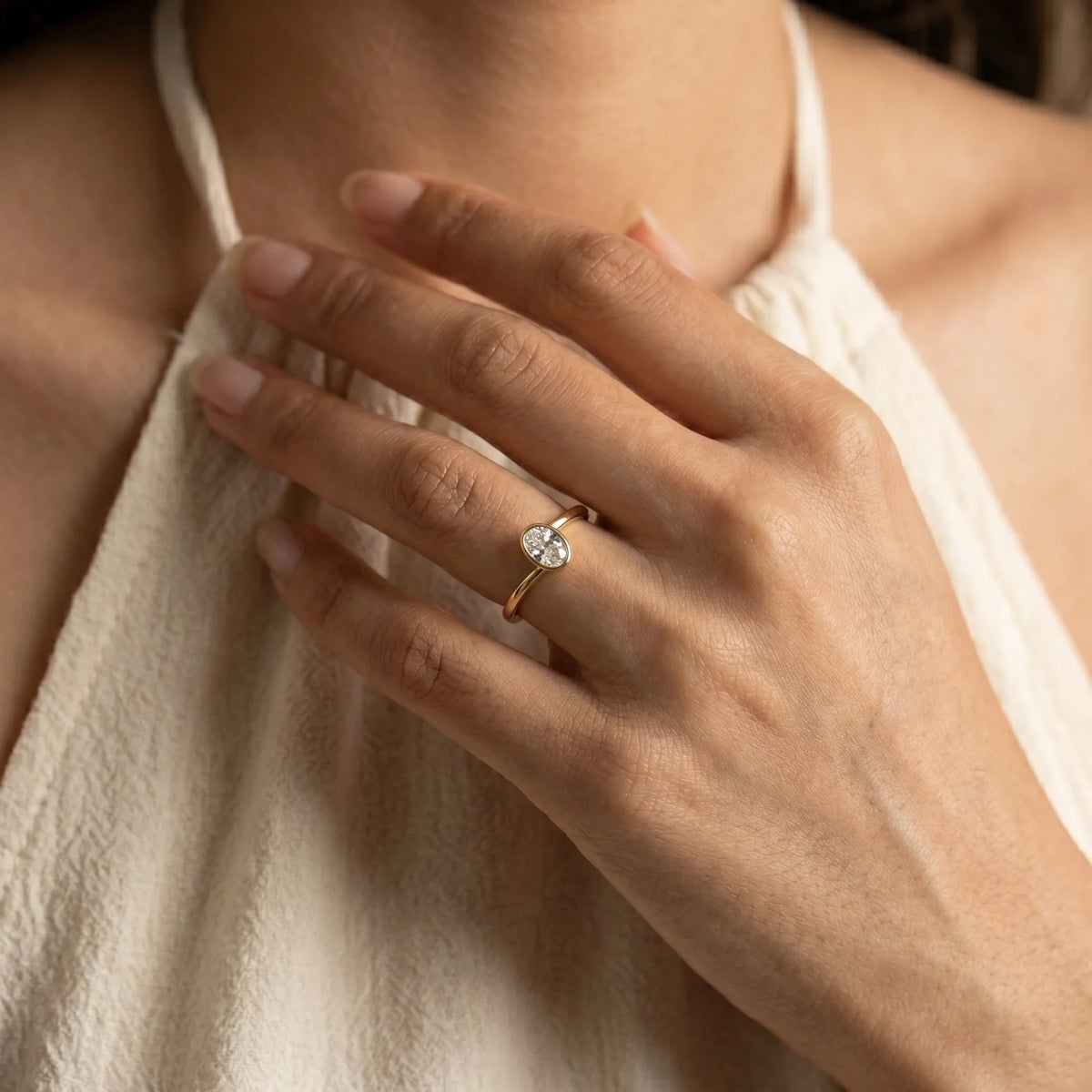 Gold Oval Bezel Solitaire Ring